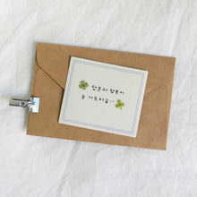 image showing example usage of a four leaf and three leaf clover sticker on a card