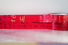 close up of red graffiti washi tape