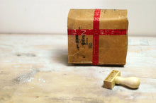 usage example of red graffiti washi tape on a package