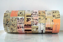 rolls of peach / tan / brown graffiti light washi tape